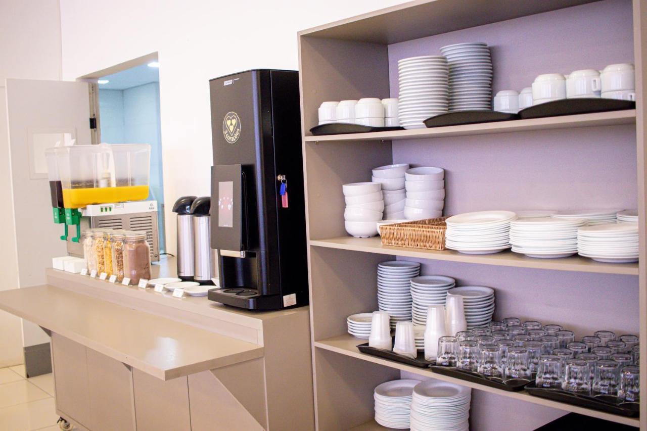 Hotel H2 Congonhas Bagian luar foto A typical self-service station