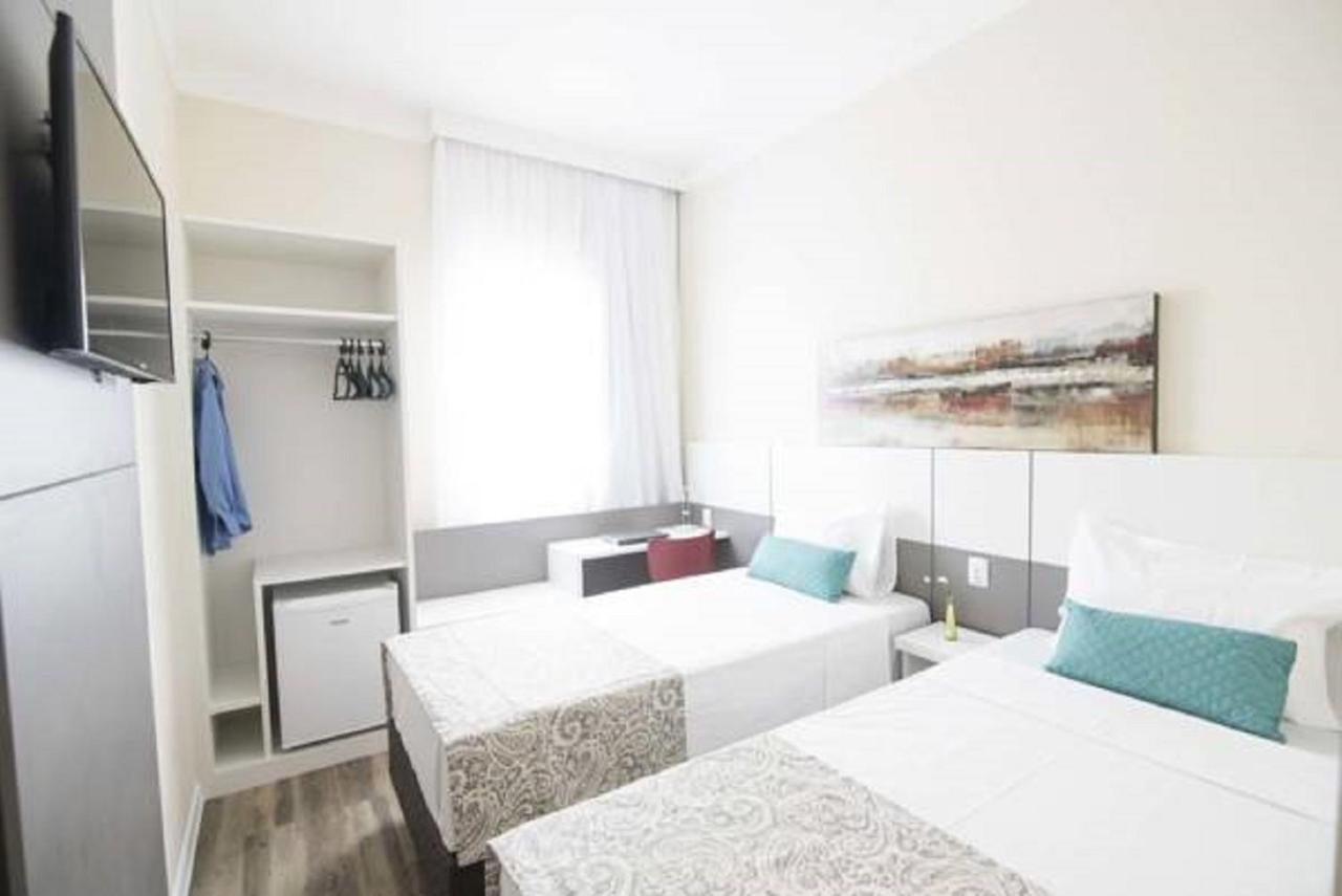 Hotel H2 Congonhas Bagian luar foto A typical room at the hotel