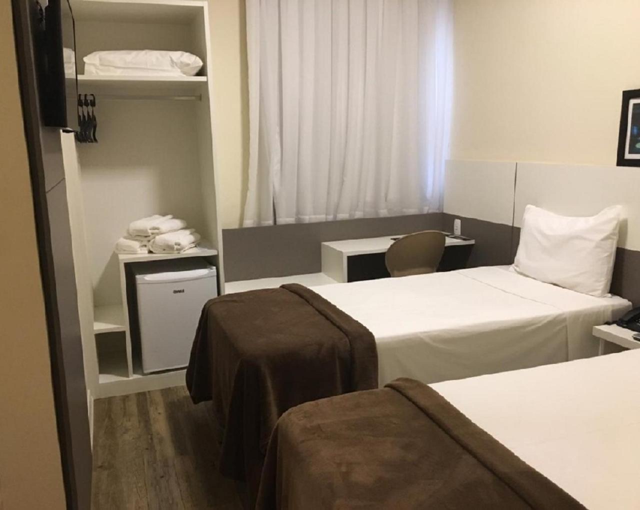 Hotel H2 Congonhas Bagian luar foto A room at the hotel